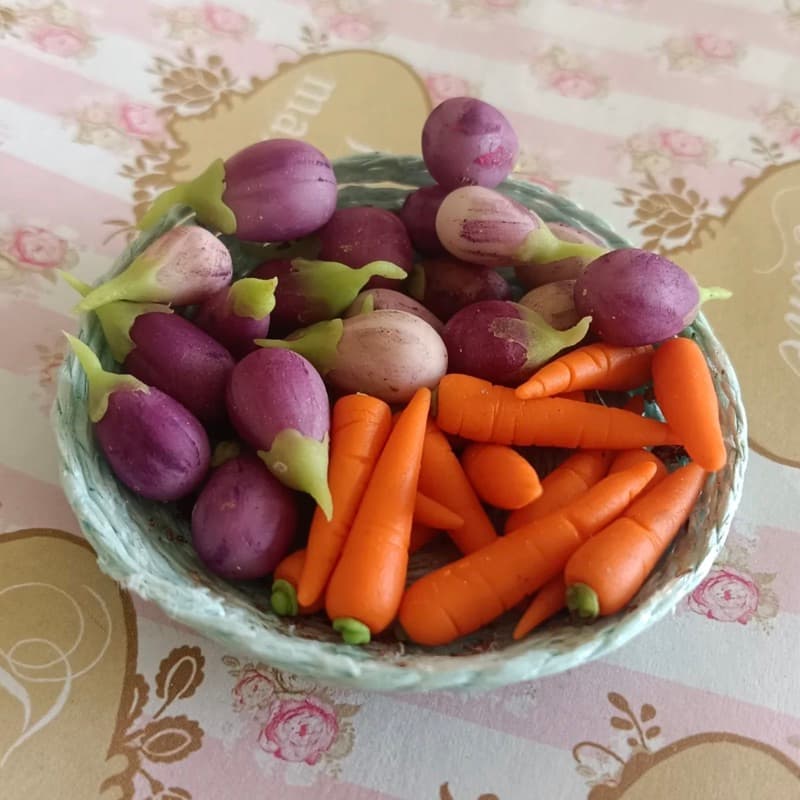 Clay brinjals and carrots