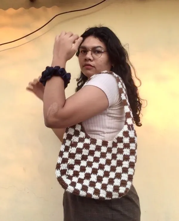 Wearing checkered bag