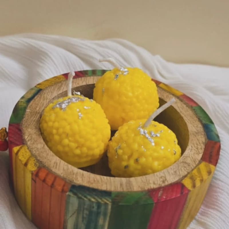 Laddoo candles with silver leaf
